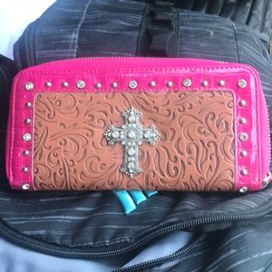 A pink cross wallet